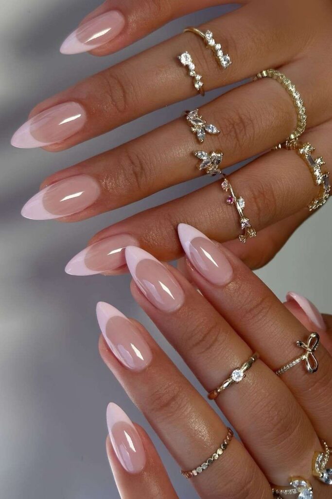Light pink French nails with glossy finish