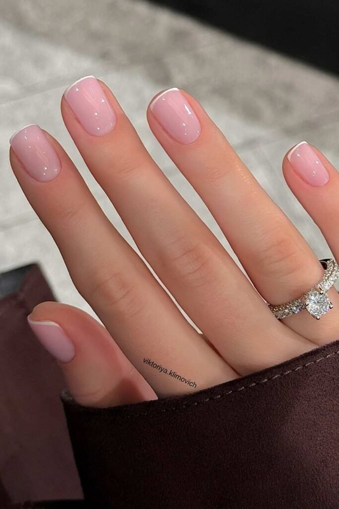 Micro French nails with sheer pink base