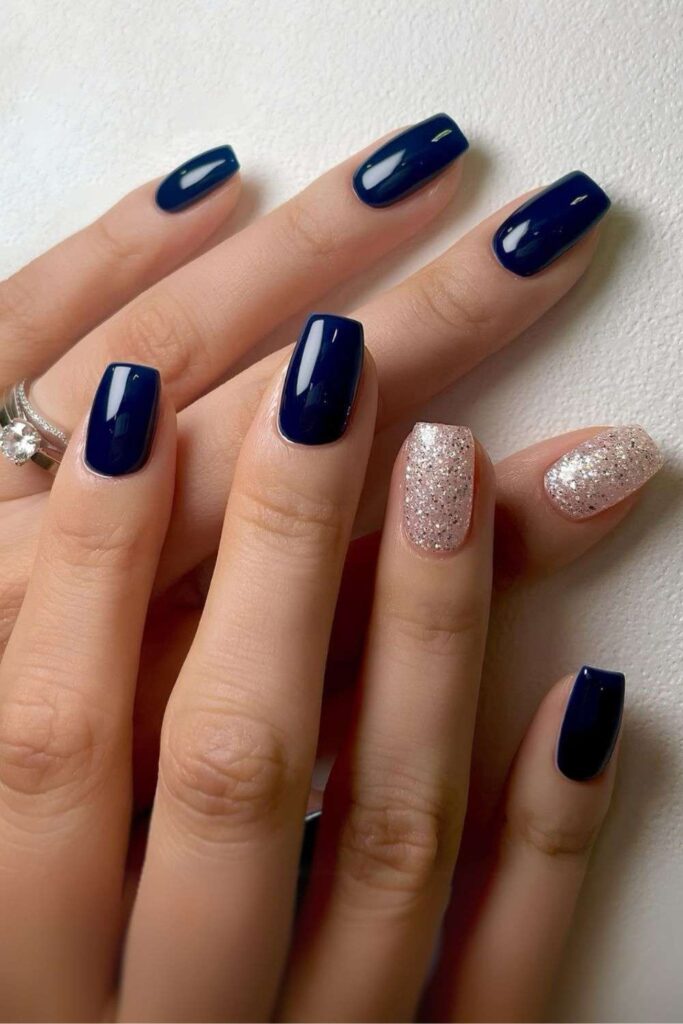 Navy blue and glitter short nails