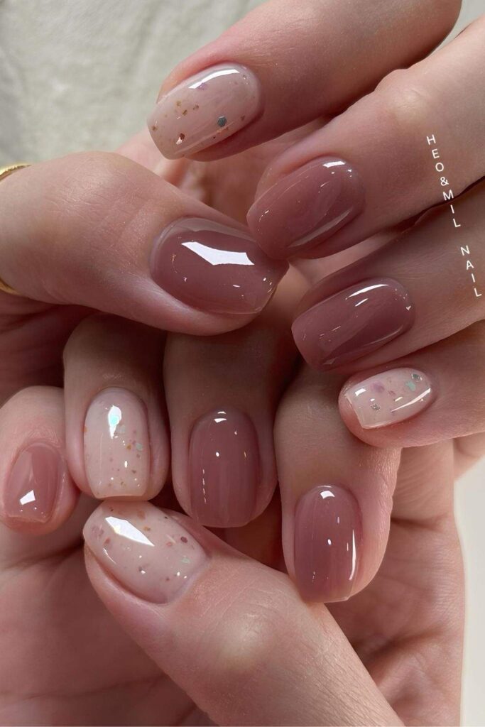 Neutral jelly nails with sparkles