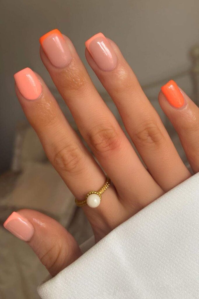 Orange and peach French and solid mix nails