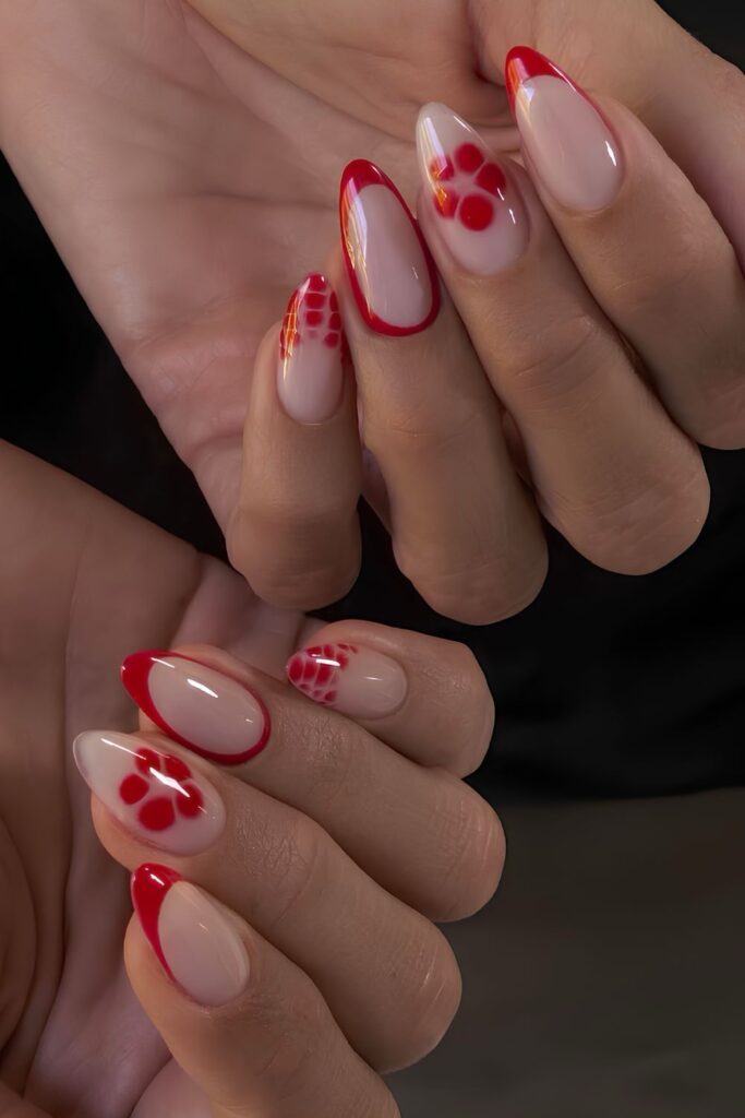 Red French nails with blooming flower and animal print