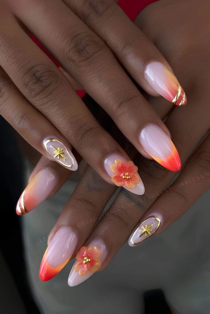 Red and orange mani with gold and 3d accents