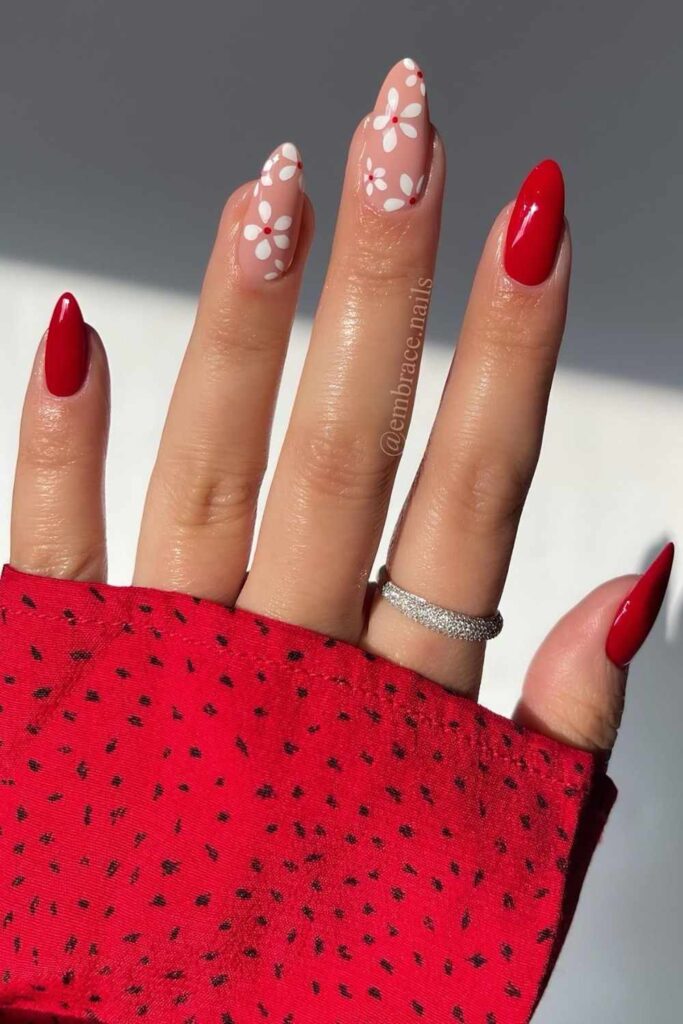 Red nails with white florals