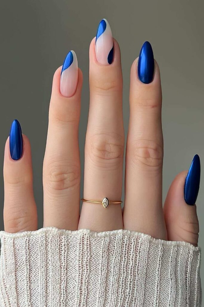Sapphire blue almond nails with negative space
