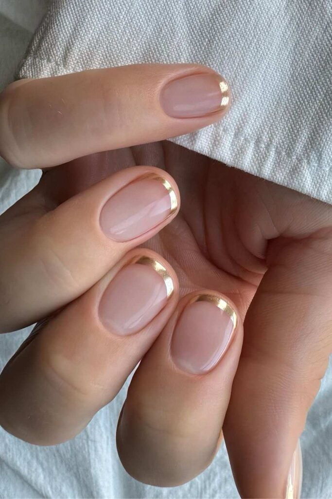 Short gold French nails