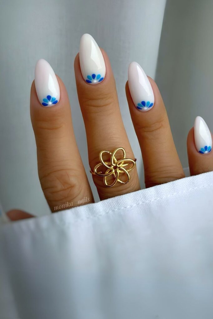 White nails with blue petals