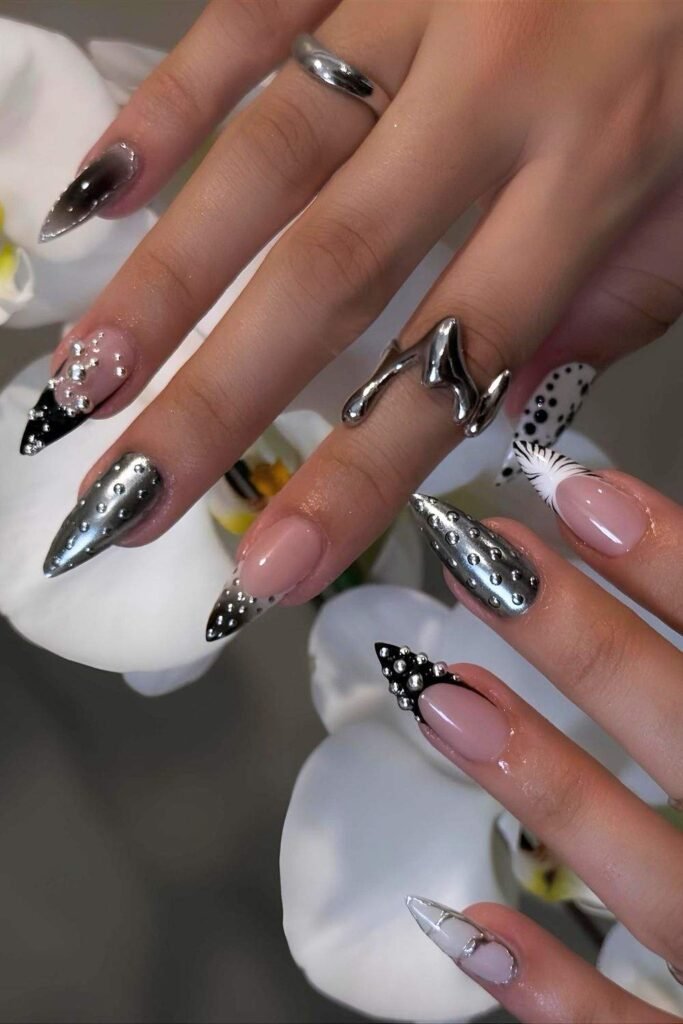 Black and metallic silver mismatched nails