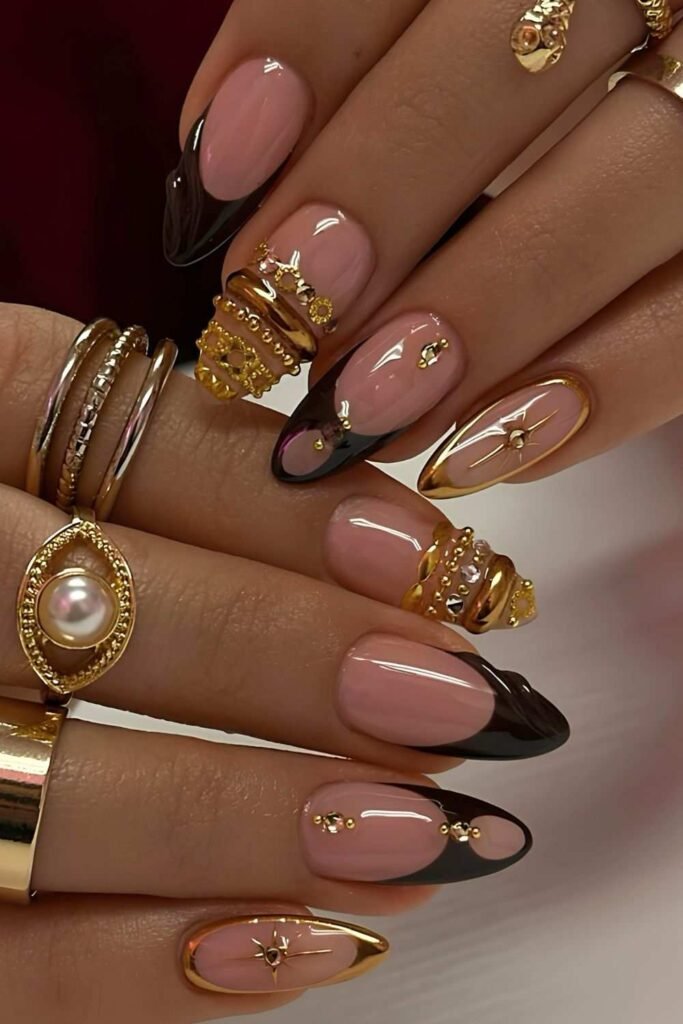 Dark brown and metallic gold nails with bangle art