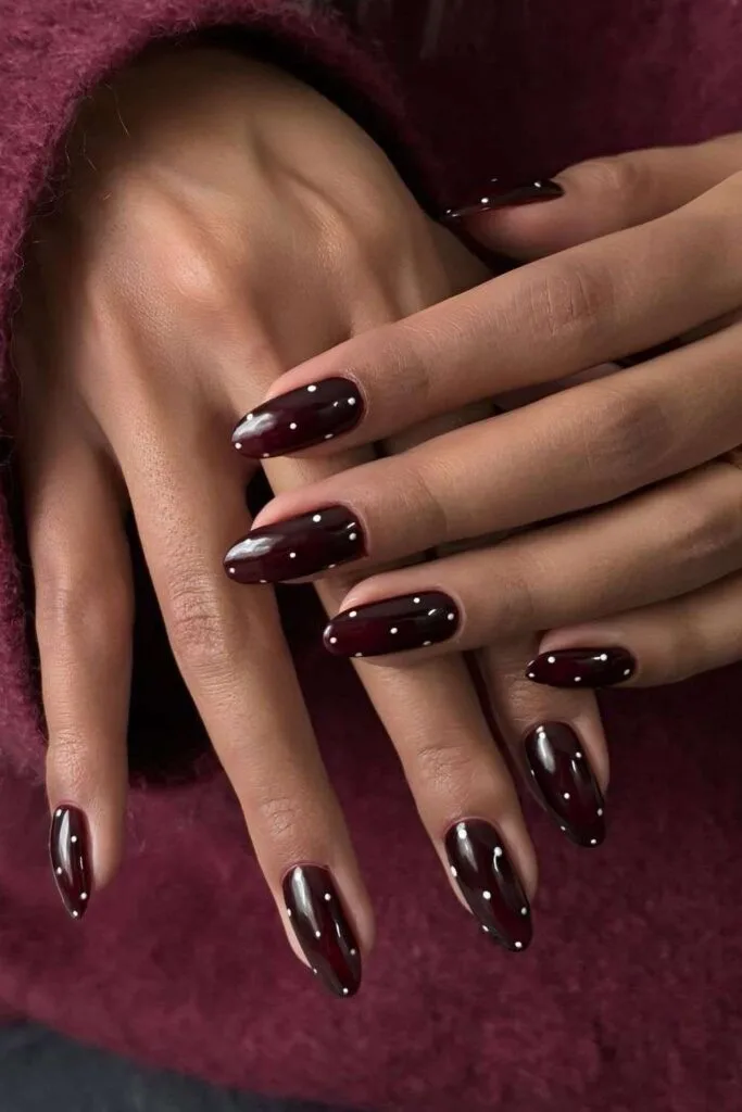Dark brown polka dot nails