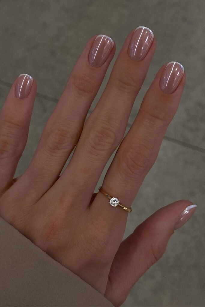 Micro French nails with glazed finish