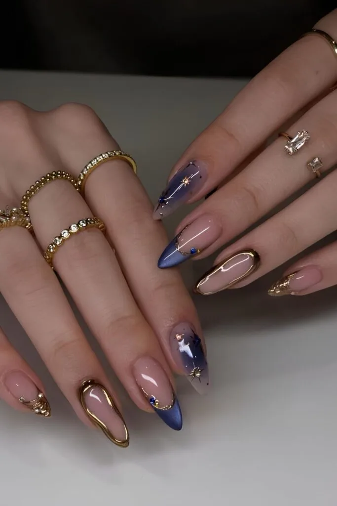 Navy blue and gold mismatched mani