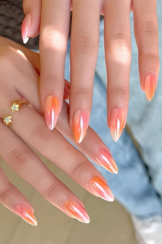 Peach and pink gradient mani with chrome finish