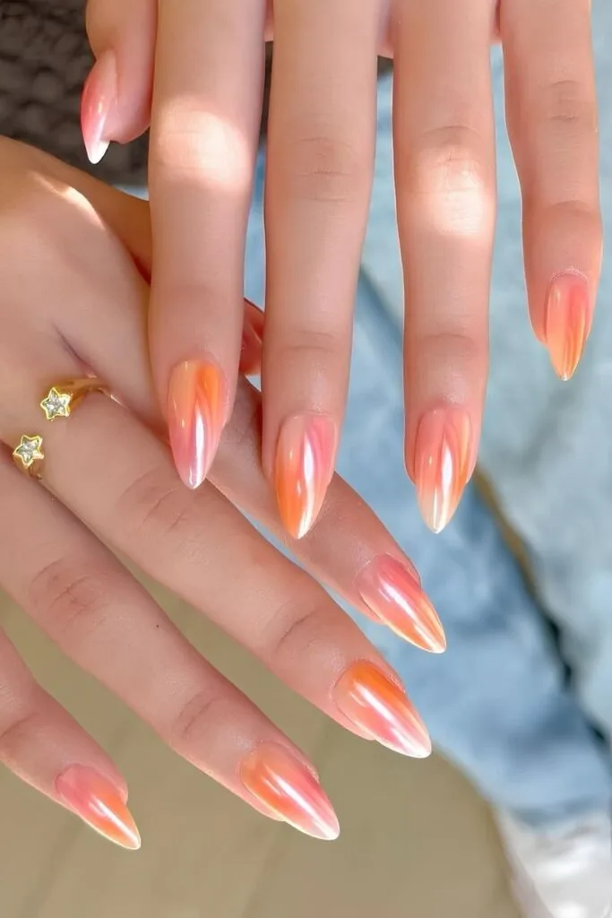 Peach and pink gradient mani with chrome finish