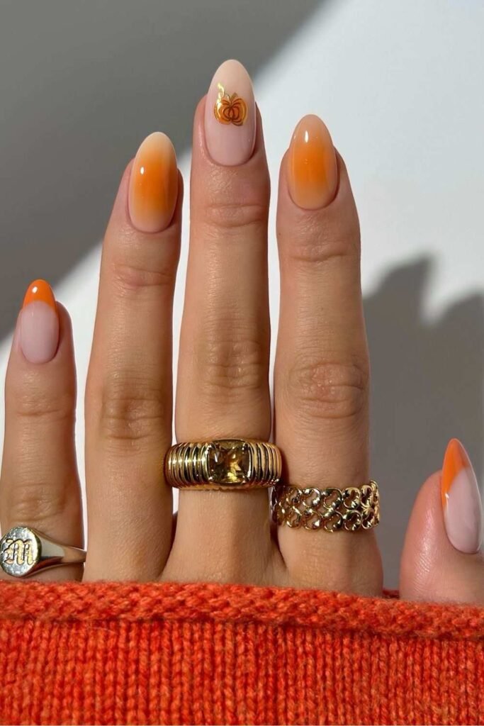 Pumpkin orange nails with aura effect