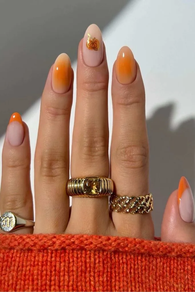 Pumpkin orange nails with aura effect
