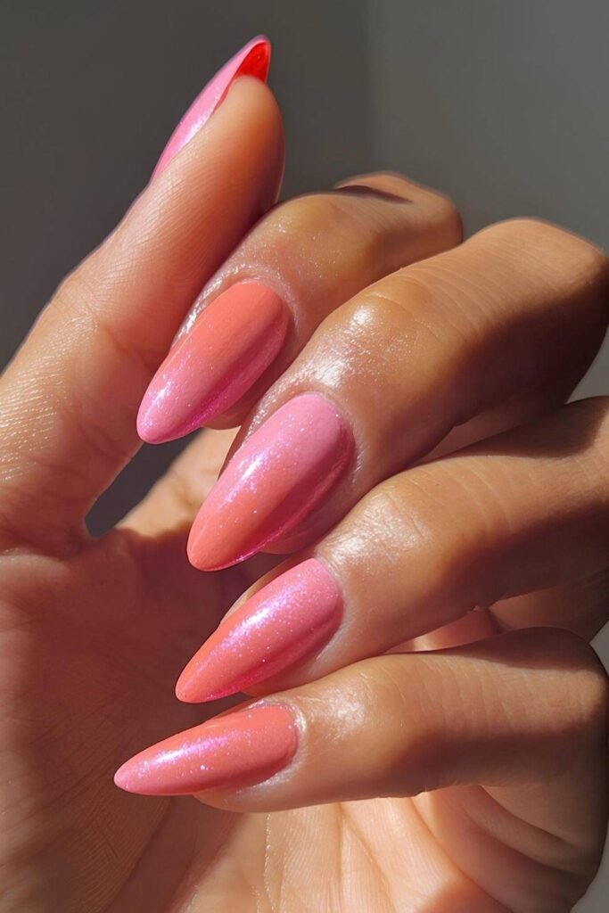 Strawberry sorbet nails in pink and coral with subtle shimmer