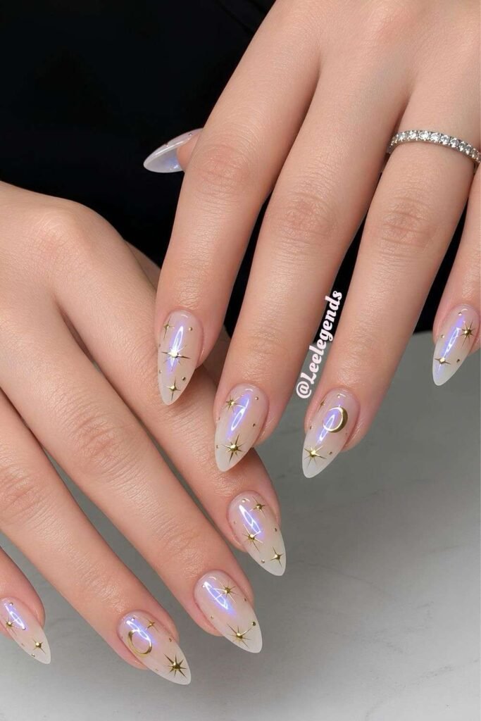 White chrome mani with gold chrome celestial accents