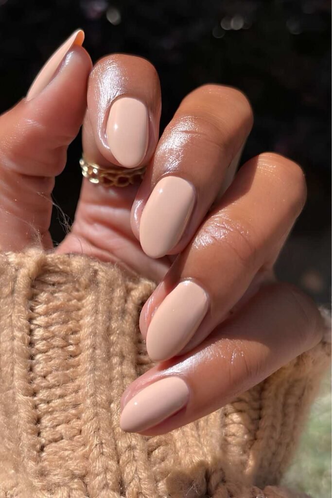 Beige short oval nails