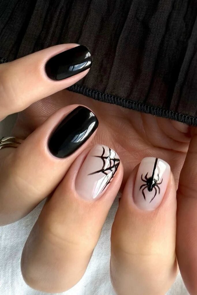 Black Halloween nails with spider details