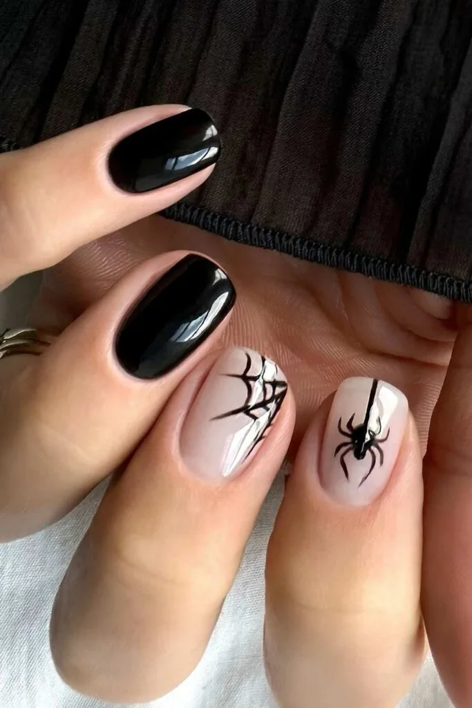 Black Halloween nails with spider details