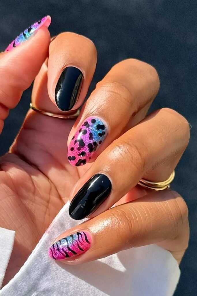 Black and pink nails with animal print and glitter