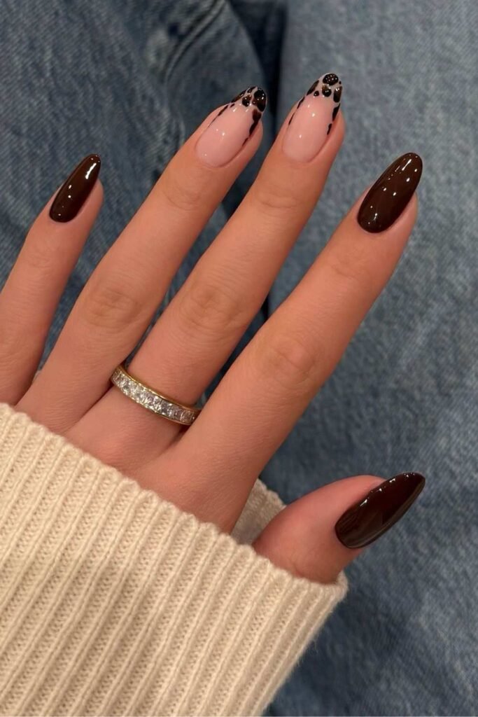 Brown nails with leopard print accents