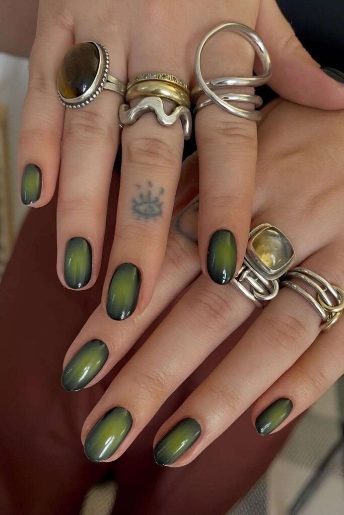 Green aura nails with olive center