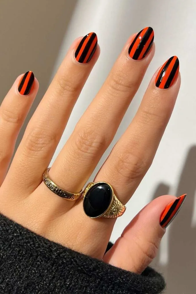Orange and black striped nails