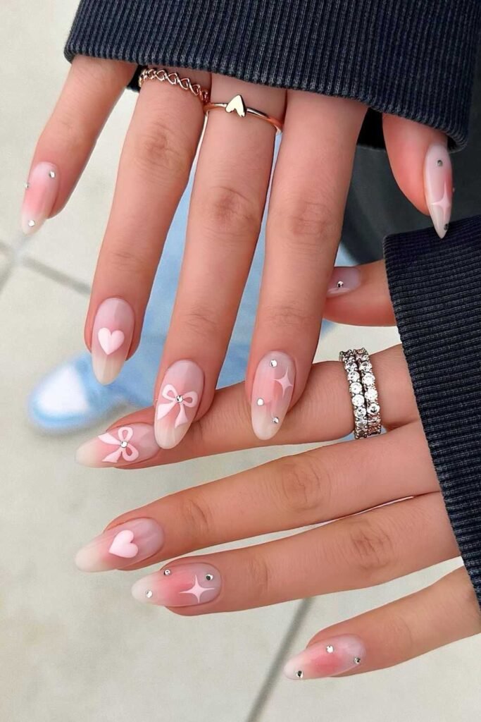 Pink blush nails with coquette details