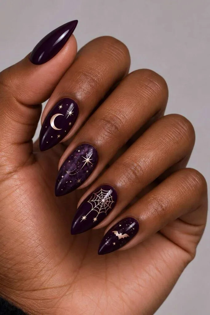 Purple witchy nails with celestial details