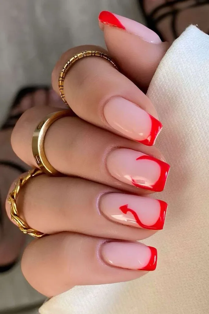 Red French nails with devil detail