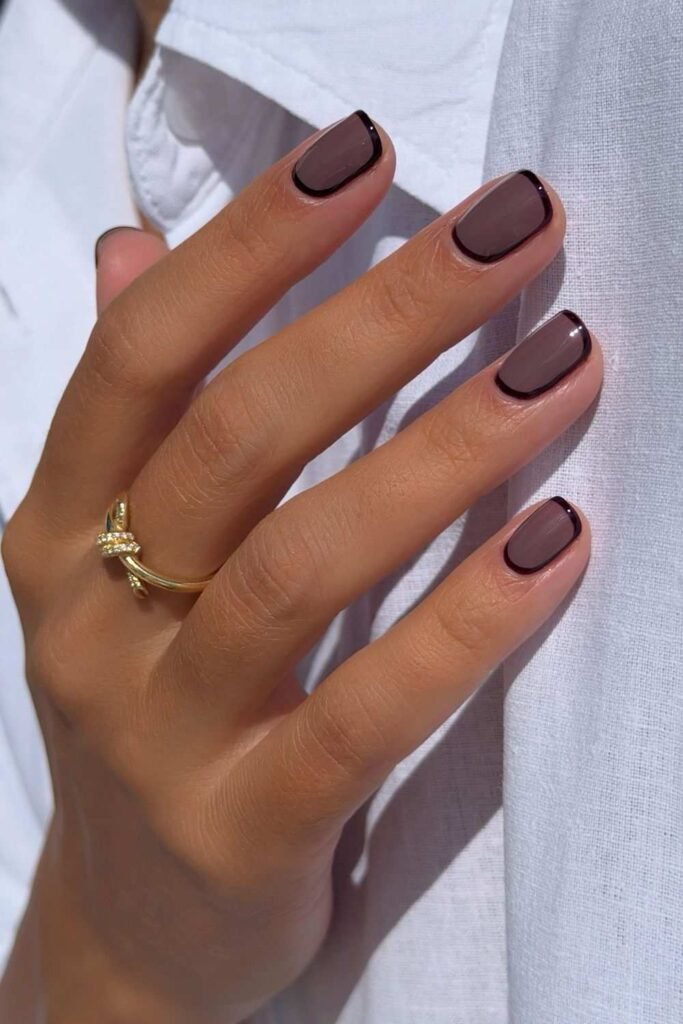 Sheer black nails with noir black edge