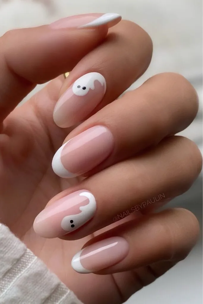 Sheer pink ghost Halloween nails