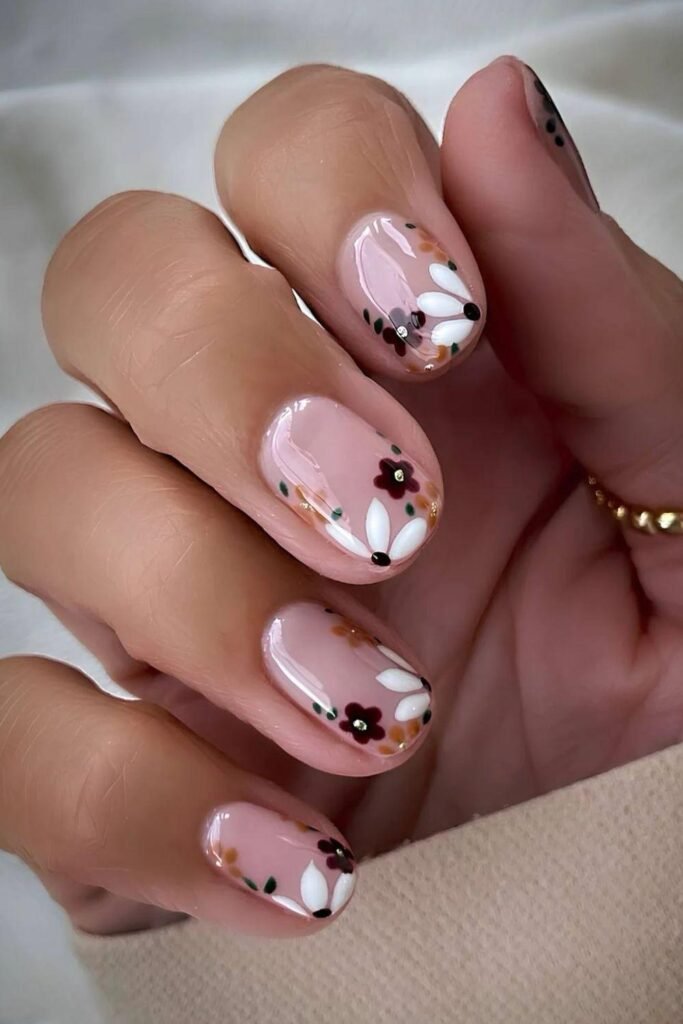 Short milky pink mani with autumn florals