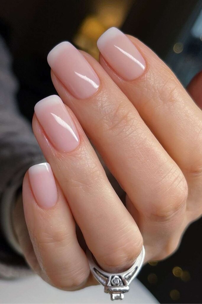 Short square foggy French nails with blurred white tips