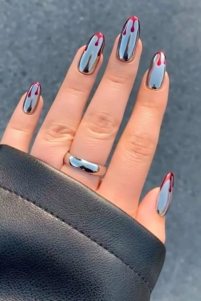 Silver chrome nails with blood drips