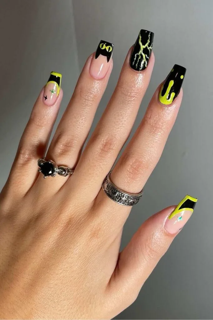 Slime green and black Halloween nails