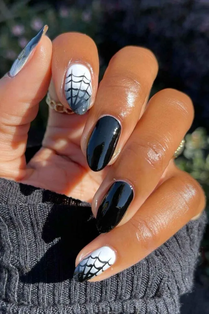 Smoky ombre Halloween nails with spiderwebs