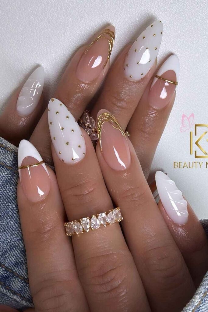 White and gold mismatched nails